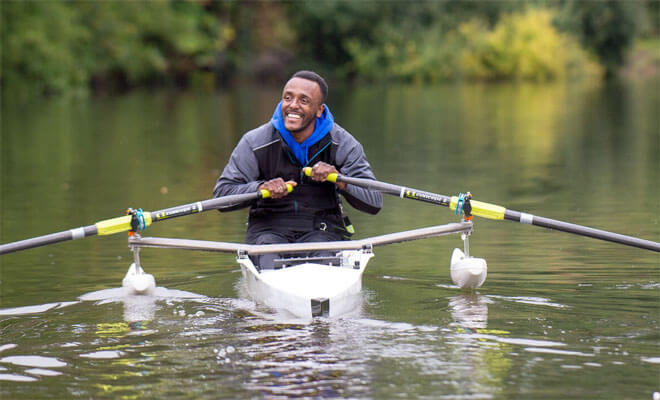a photo of our client Ainsley rowing 